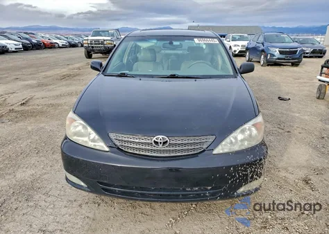 2003 Toyota Camry Le z USA, uszkodzony, nr VIN JTDBF30K830094269